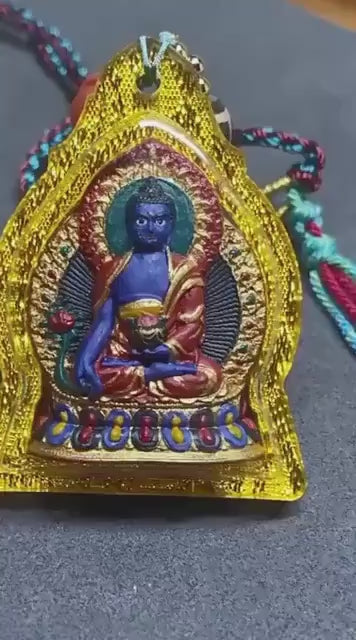 Load video: Hand-Painted Medicine Buddha Tsatsa Pendant, Mineral Pigment Tibetan Amulet, Spiritual Healing Talisman Necklace, Miniature Thangka Art Gift